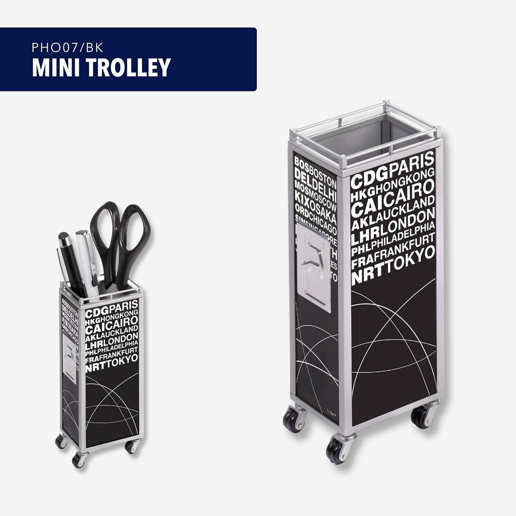 Troika MINI TROLLEY – PHO07/BK – Pen holder in the shape of an in-flight service trolley – sides printed with airport motif – metal– matt – chrome plated – black, white original